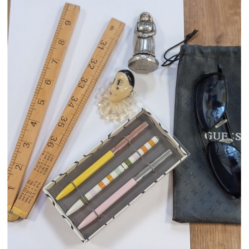 2 - Selection of mixed items to include wooden ruler, pens, Guess sunglasses and more