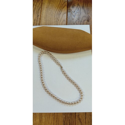 7 - Vintage pearl necklace in a case