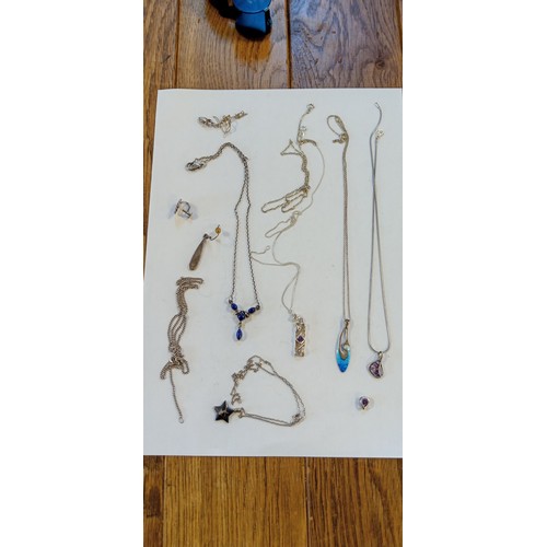 49 - Selection of mainly silver marked necklaces, pendants and earrings