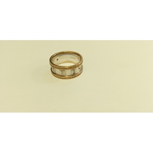 73 - Mans ring white and yellow metal stamped 375 maker RG stamped DDIA size S approx. weighs 7.3g approx