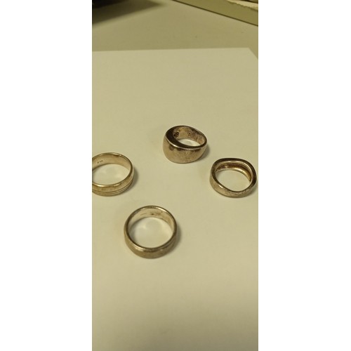 82 - 4 silver mens rings weighs 48g approx.