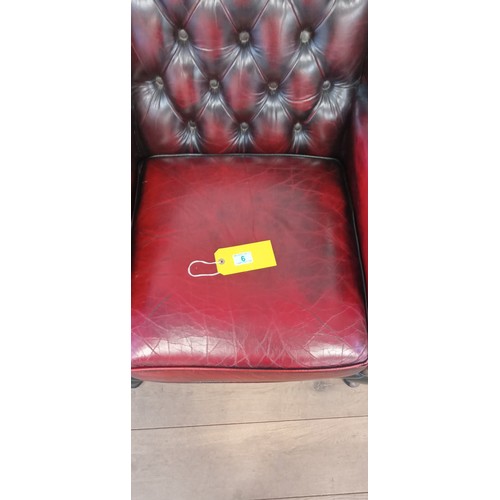 6 - Blood Ox Chesterfield wingback chair with cat claw marks