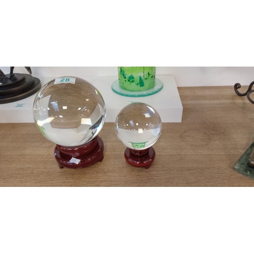 28 - 2 crystal sphere on stands