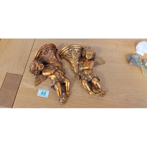 49 - Pair of Cherub wall sconce