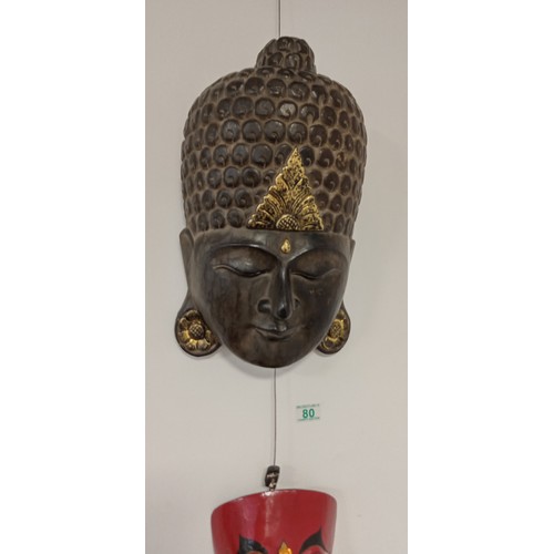 80 - Wooden Buddhist face mask plus one other