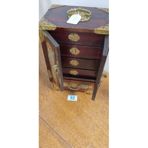 92 - Small Oriental cabinet in hard wood and stone pale green possible jade box