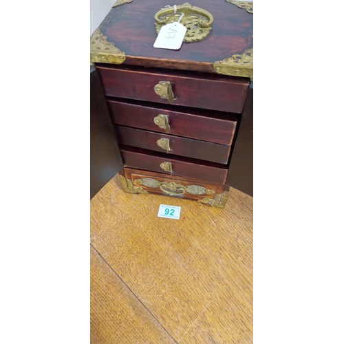 92 - Small Oriental cabinet in hard wood and stone pale green possible jade box