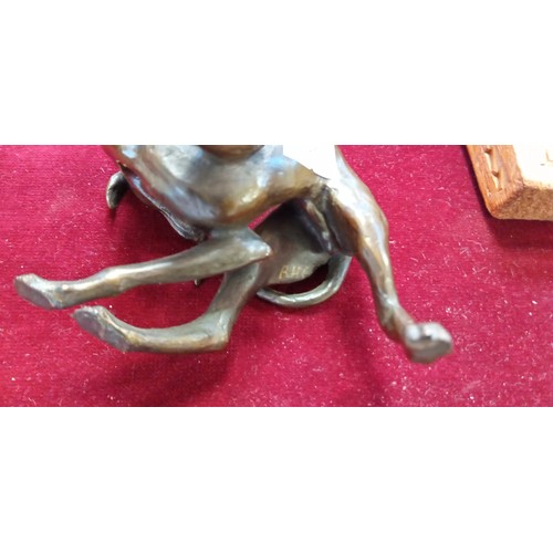 118 - Bronze art deco style whippet/ greyhound figurine initialed RHC