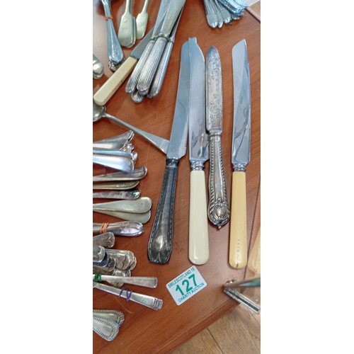 127 - Selection of vintage cutlery to include knives, forks, spoons and more