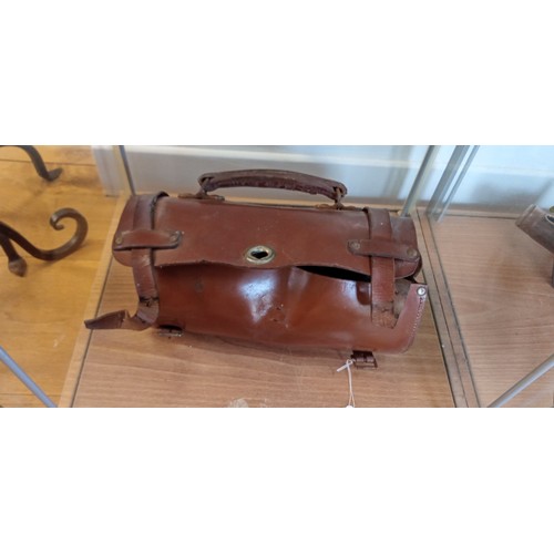 145 - Pair of vintage bowls in leather case