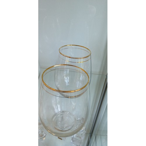 153 - 4 Stemless vintage wine glasses with double gold rims