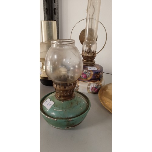 200 - Selection of vintage oil lamps to include nursery lamp