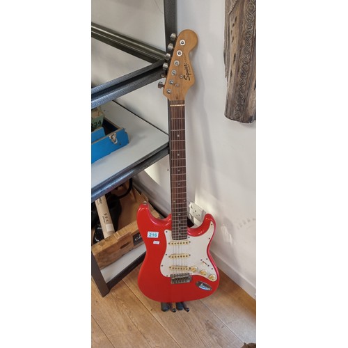 216 - Vintage Squire Strat by Fender electric guitar with stand