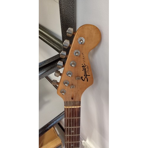 216 - Vintage Squire Strat by Fender electric guitar with stand