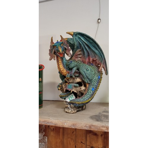 237 - Resin dragon on scull ornament