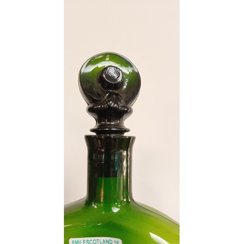 238 - Vintage green art glass decanter with crown