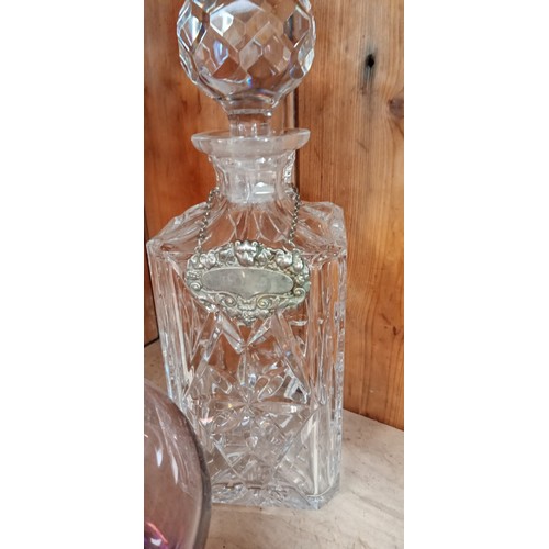 242 - 2 Crystal decanters plus one other