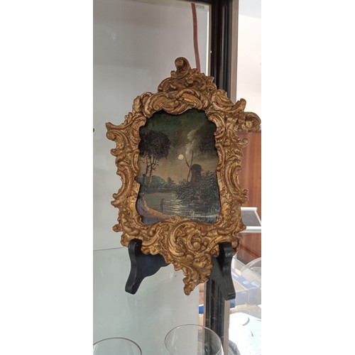 273 - Pair of night scene Dutch oils in antique style plaster frame