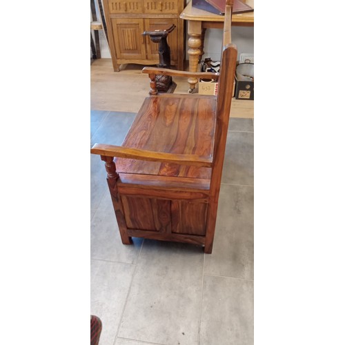 299 - Indonesian hardwood settle with hinged seat