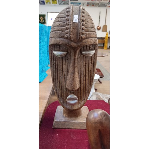 388 - African face mask and standing African figurines