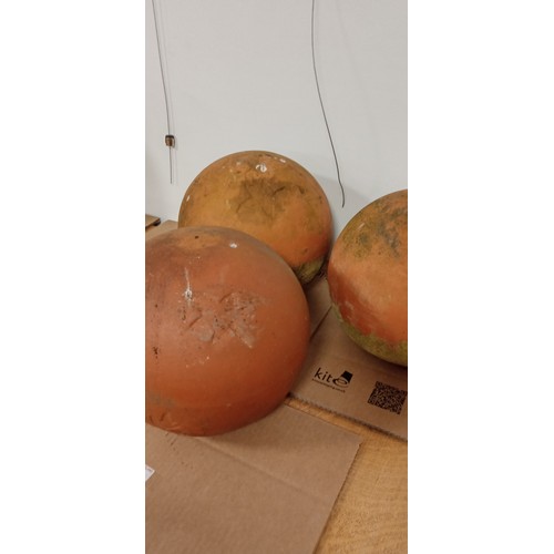 46 - 3x Terra cotta exterior balls with flat bases