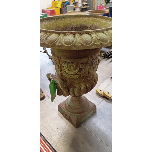 266 - Pair of cast garden urns standing 60cm high approx.