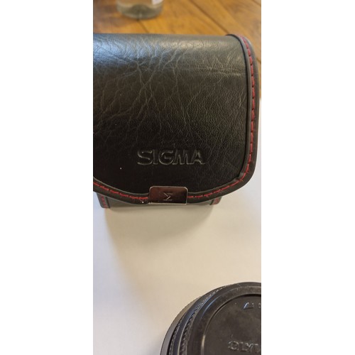 1 - Sigma-XQ filtermatic multi-coated 1:2.8 f=24mm lens made in Japan with original Sigma case