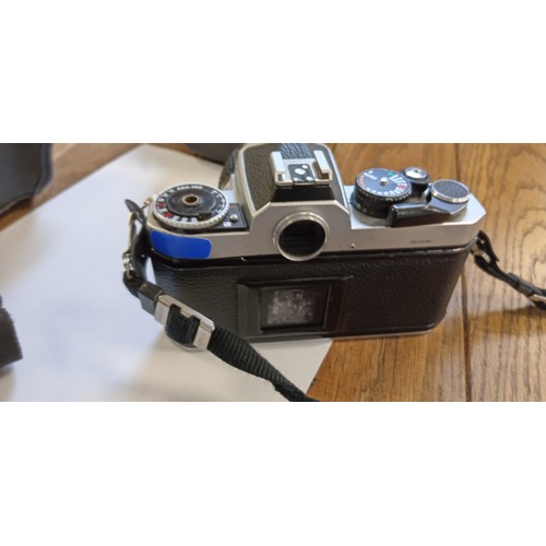 2 - Nikon FE2 35mm camera with Nikkor 28mm lens plus Praktica B100 electronic camera