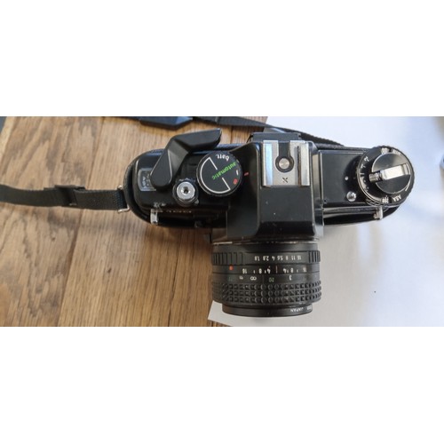 2 - Nikon FE2 35mm camera with Nikkor 28mm lens plus Praktica B100 electronic camera