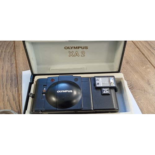 7 - Olympus XA 2 electronic flash camera made in Japan plus Olympus tough TG-310 14 megapixel camera