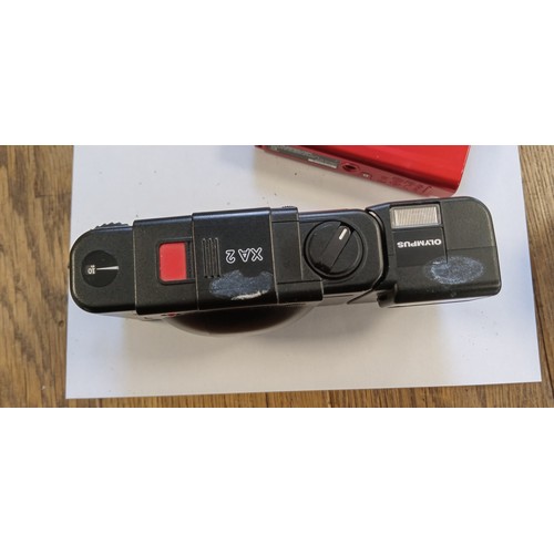 7 - Olympus XA 2 electronic flash camera made in Japan plus Olympus tough TG-310 14 megapixel camera