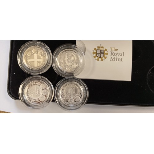 18 - Royal Mint 2011 UK Edinburgh £1 silver proof coin set with COAS (1 COA is missing)