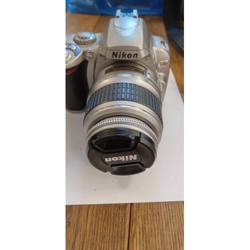 15 - Nikon D40 camera with Nikon DX AF S Nikkor 18-55mm 1.35-5.6 GII ED lens plus Sigma 70-300mm 1:4-5.6 ... 