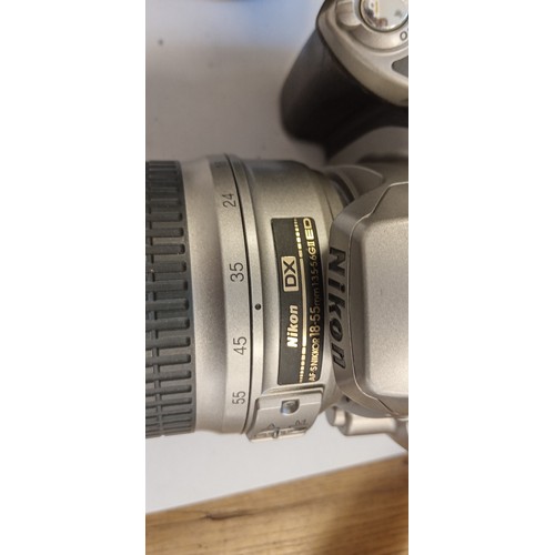 15 - Nikon D40 camera with Nikon DX AF S Nikkor 18-55mm 1.35-5.6 GII ED lens plus Sigma 70-300mm 1:4-5.6 ... 
