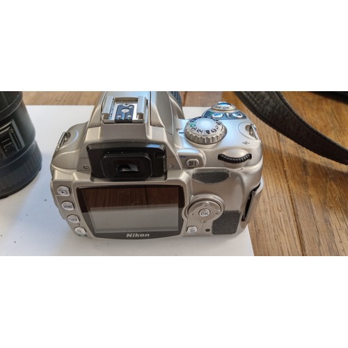 15 - Nikon D40 camera with Nikon DX AF S Nikkor 18-55mm 1.35-5.6 GII ED lens plus Sigma 70-300mm 1:4-5.6 ... 