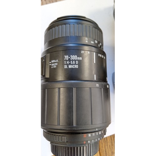 15 - Nikon D40 camera with Nikon DX AF S Nikkor 18-55mm 1.35-5.6 GII ED lens plus Sigma 70-300mm 1:4-5.6 ... 