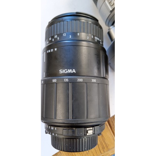 15 - Nikon D40 camera with Nikon DX AF S Nikkor 18-55mm 1.35-5.6 GII ED lens plus Sigma 70-300mm 1:4-5.6 ... 