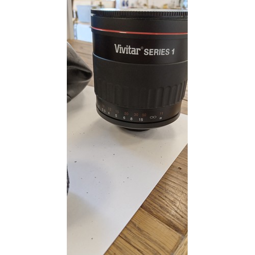 16 - Vivitar Series 1 500mm mirror lens plus Nikon lens series E 50mm 1:1.8 lens