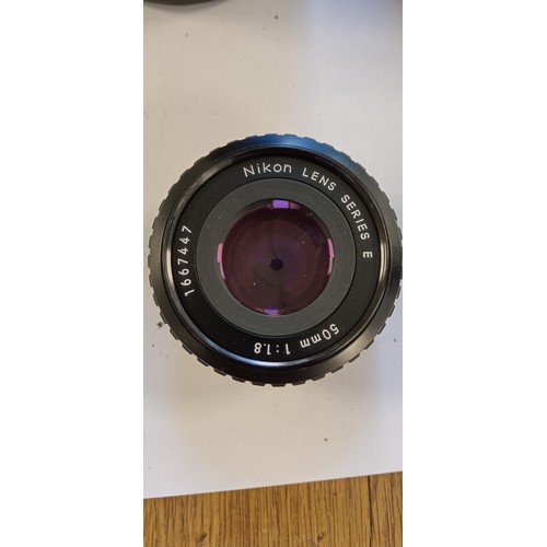 16 - Vivitar Series 1 500mm mirror lens plus Nikon lens series E 50mm 1:1.8 lens