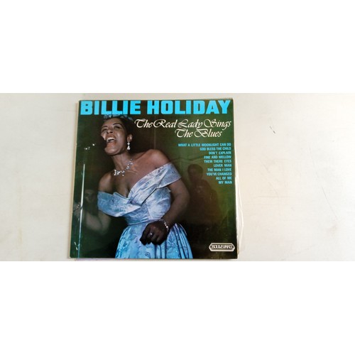 57 - 7 LP records on various artists see photos