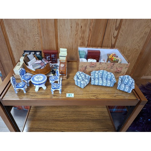 81 - Good selection of dolls house furniture