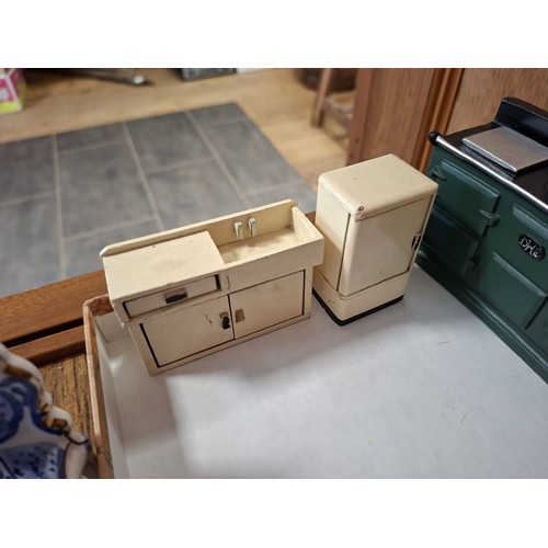 81 - Good selection of dolls house furniture