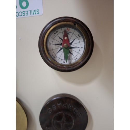 92 - 1 Bakelite and 1 metal pocket compass