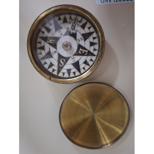 92 - 1 Bakelite and 1 metal pocket compass