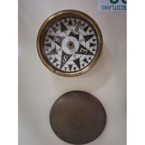 92 - 1 Bakelite and 1 metal pocket compass