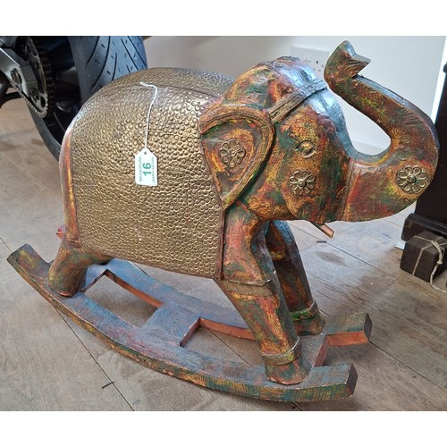 16 - Large wooden & brass rocking elephant stands 48cm H approx.