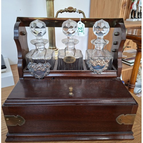 27 - Antique tantalus with decanters and the unusual 3 glass drawer set