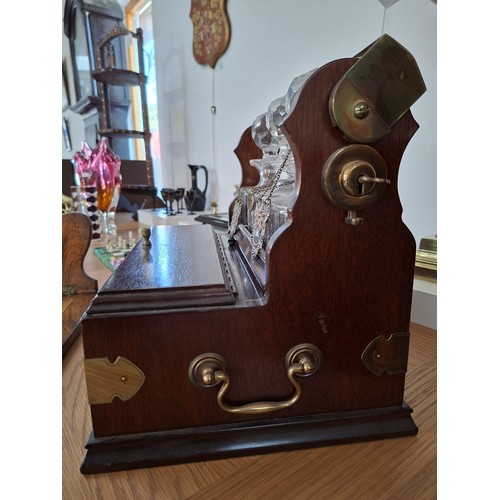 27 - Antique tantalus with decanters and the unusual 3 glass drawer set