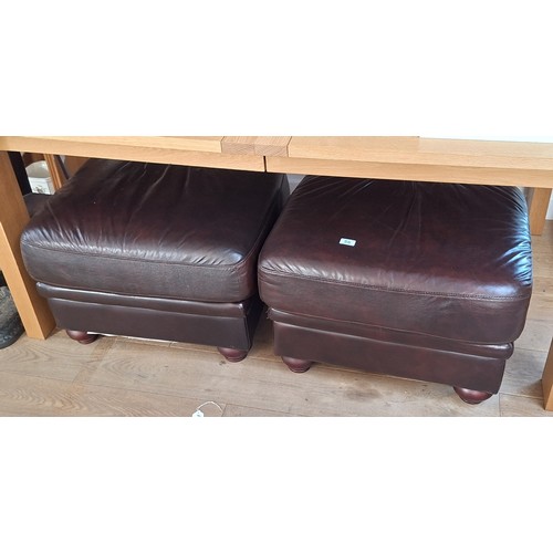 56 - Pair of leather large footstools 68cm W each approx.