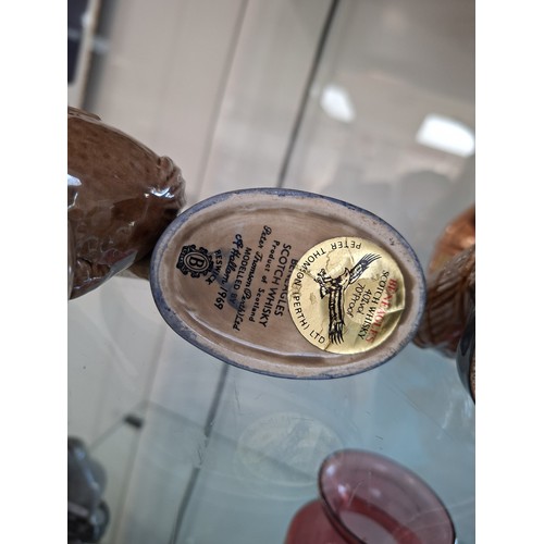 57 - 4 x Ben Eagles scotch whisky figurines 'Haggis 1972' & 'Nessie1969' full decanters plus 1969 eagle a... 